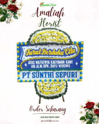 Papan Bunga Duka di Darat